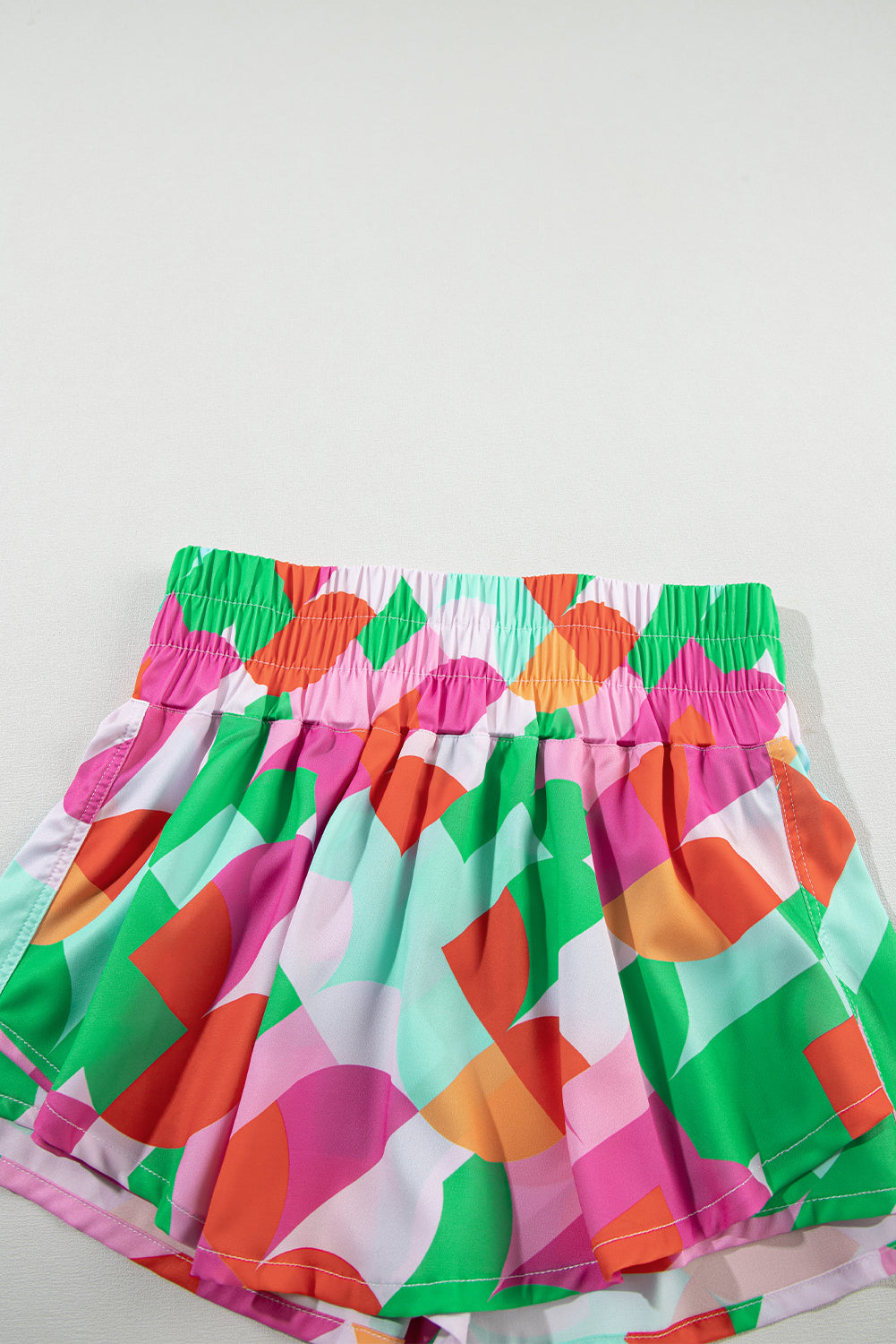 Abstract Smocked Waist Flared Shorts