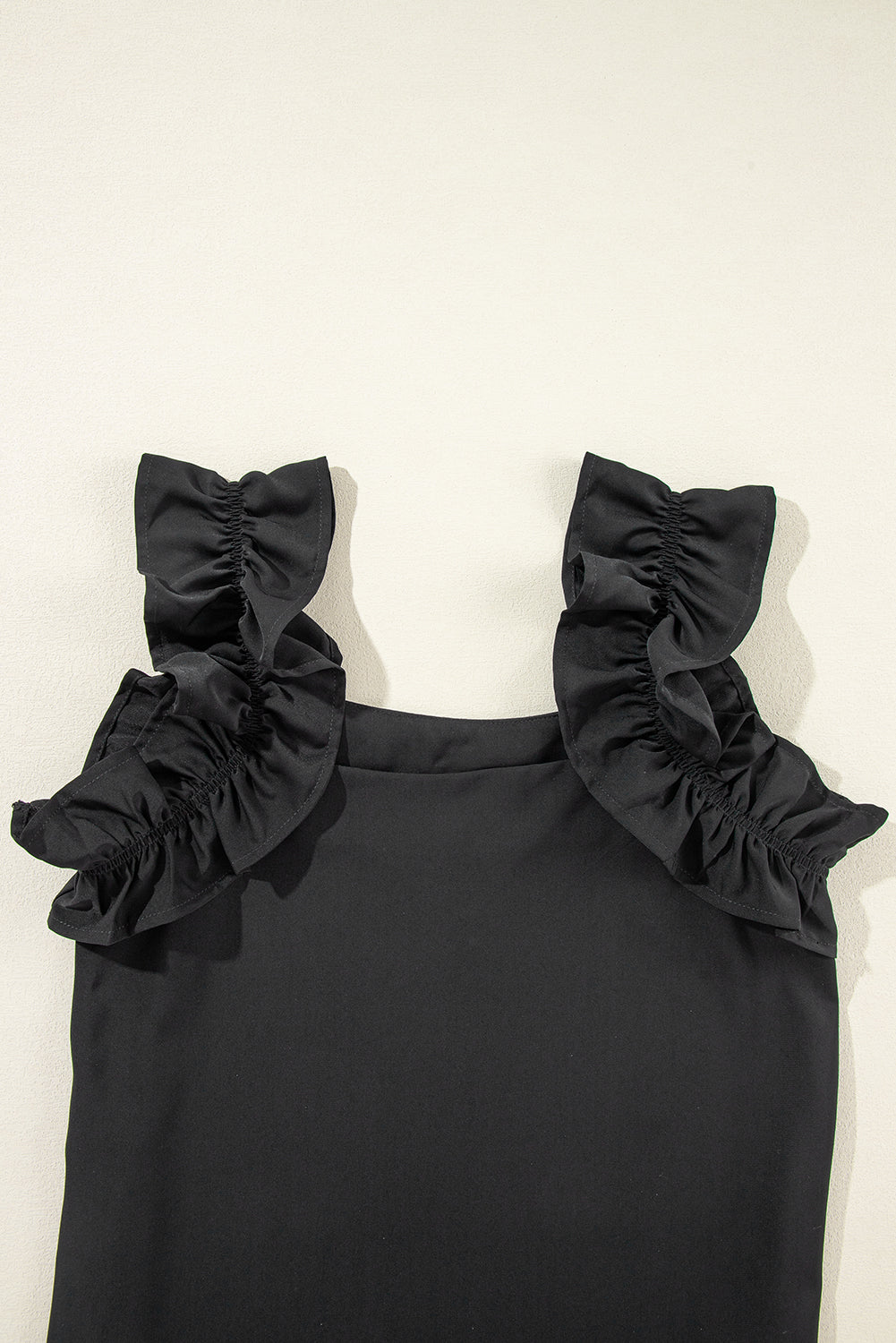 Ruffle Trim Sleeveless Blouse